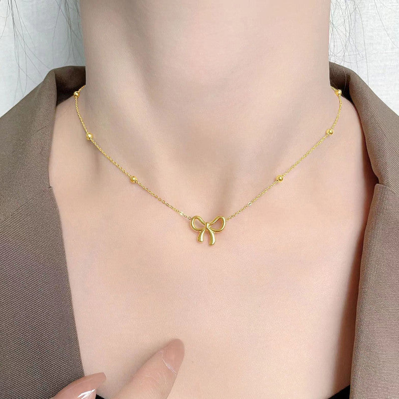 Golden Grace Bow Necklace