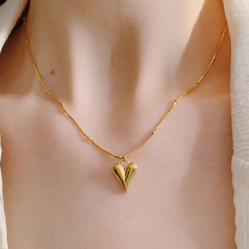 Golden Embrace Heart Pendant Necklace