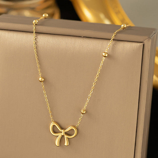 Golden Grace Bow Necklace