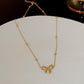 Golden Grace Bow Necklace