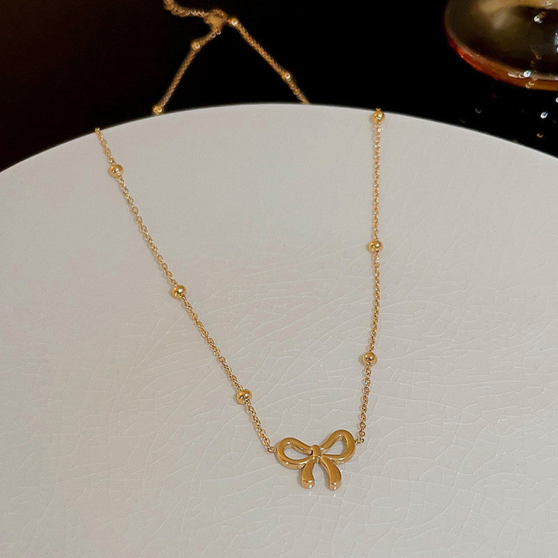 Golden Grace Bow Necklace