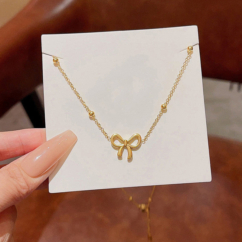 Golden Grace Bow Necklace