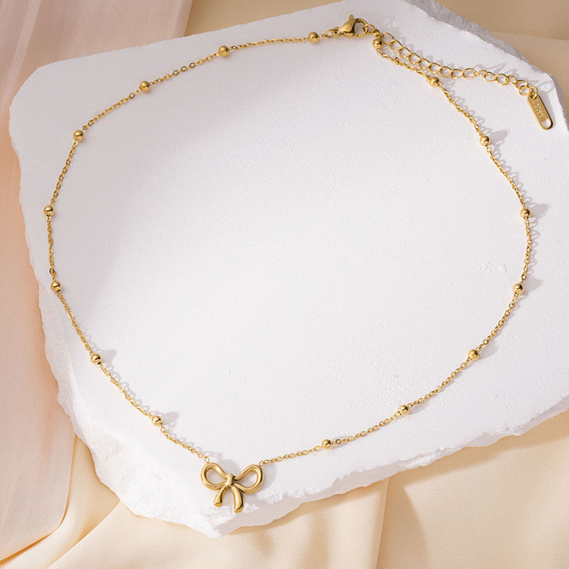 Golden Grace Bow Necklace