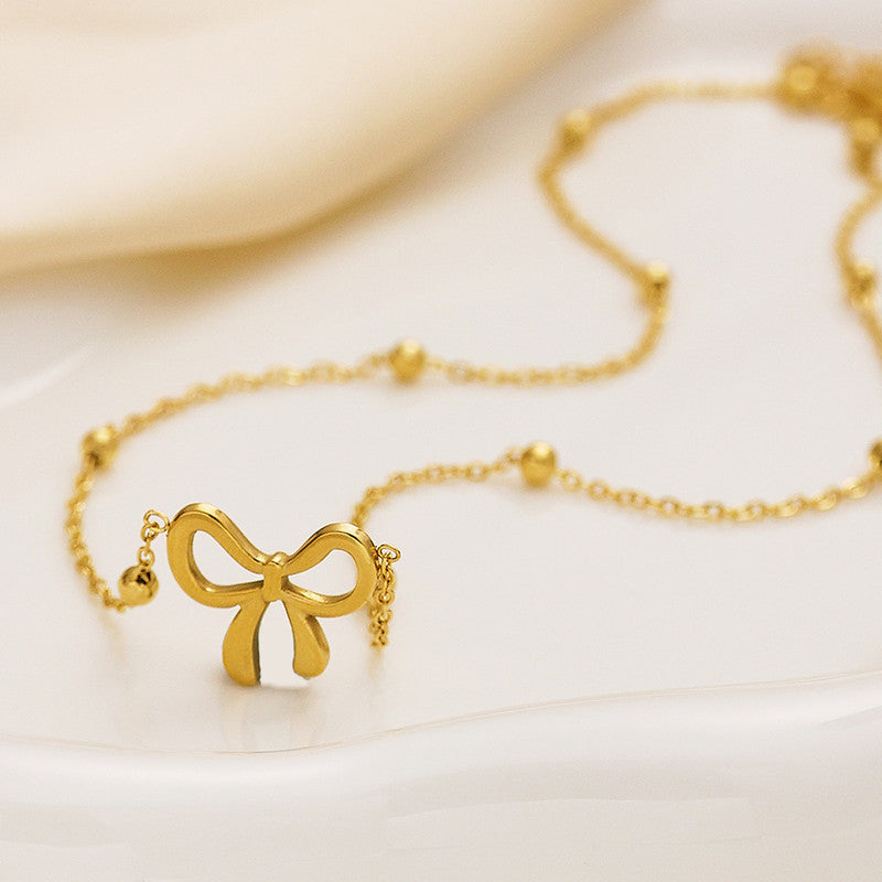 Golden Grace Bow Necklace