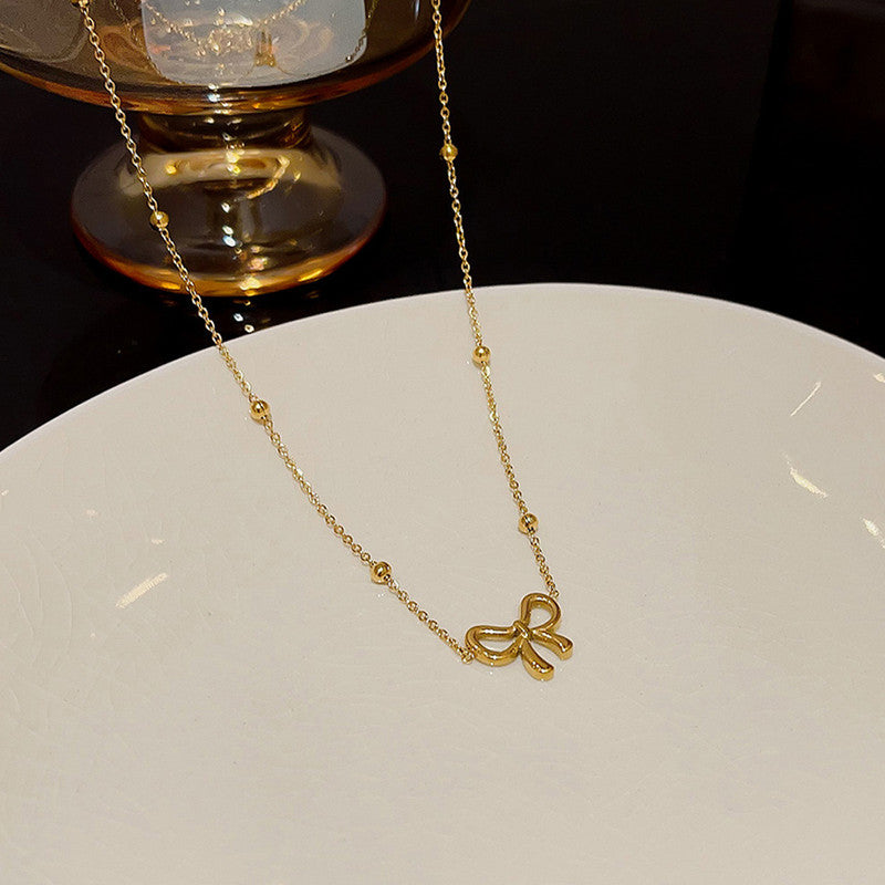 Golden Grace Bow Necklace