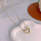 Golden Embrace Open Heart Necklace